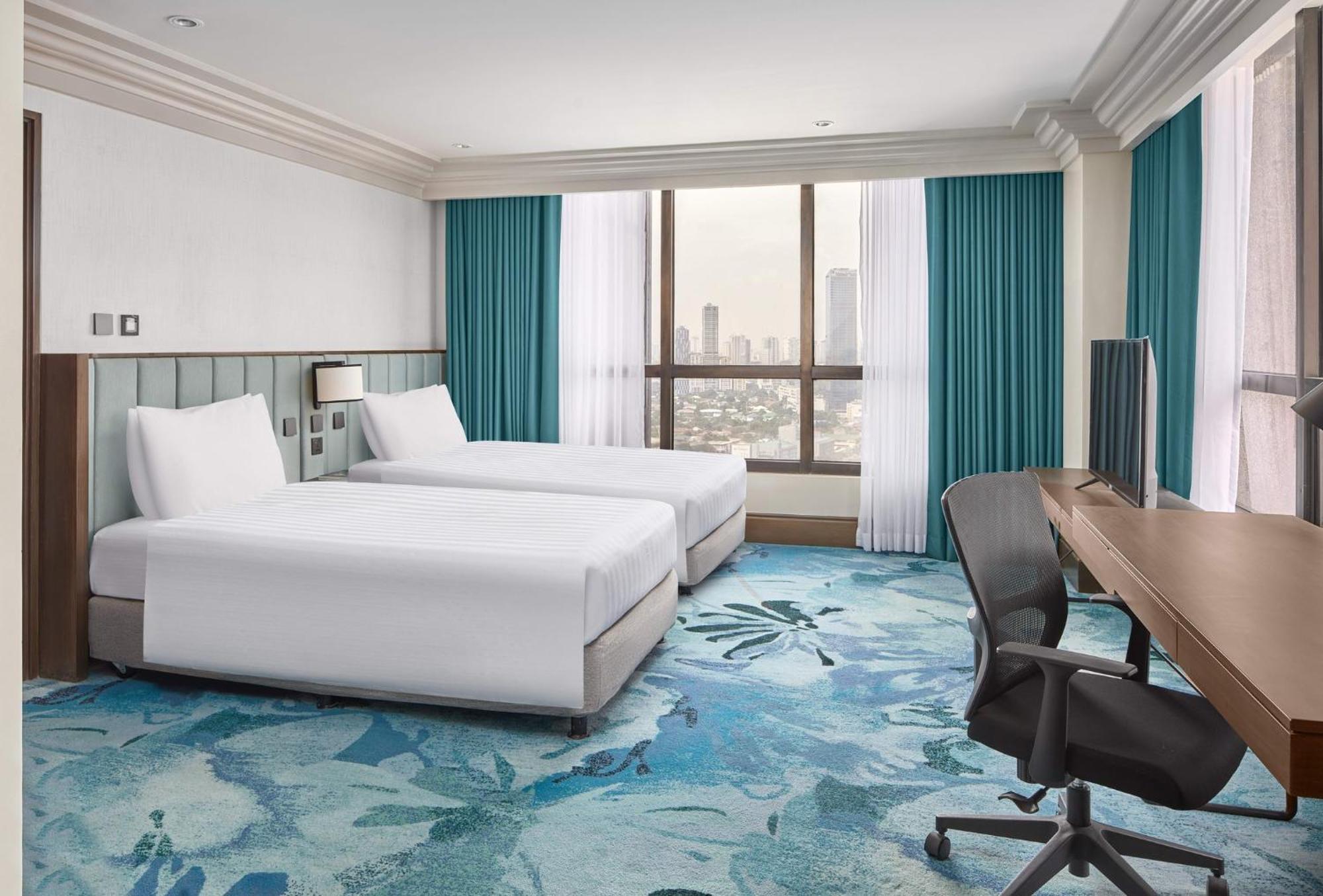Holiday Inn & Suites Manila Galleria By Ihg Pasig City Esterno foto